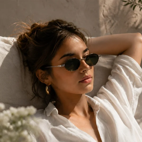 Woman wearing dark brown Selen Eyewear sunglasses in sunlight