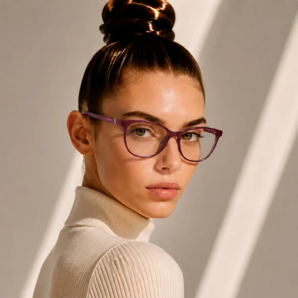 Woman wearing purple Selen Eyewear glasses in warm light