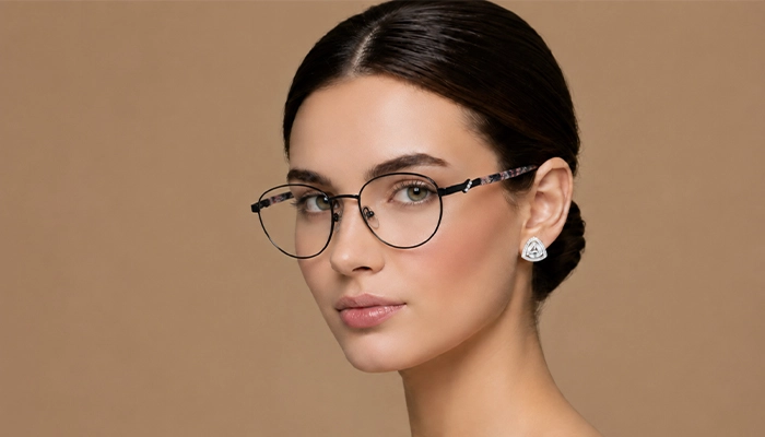 Woman wearing black round Selen Eyewear glasses