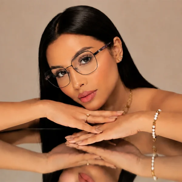 Woman wearing Selen Eyewear full-rim metal optical glasses with elegant styling.
