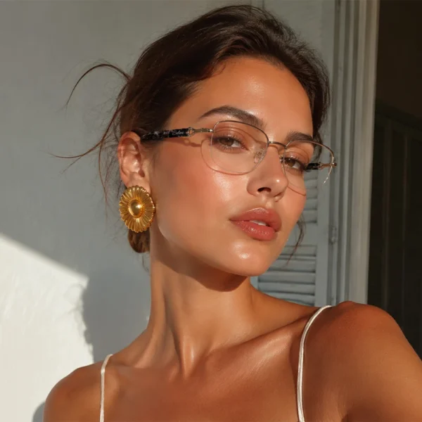 Woman wearing Selen Eyewear rimless optical glasses in warm golden sunlight.