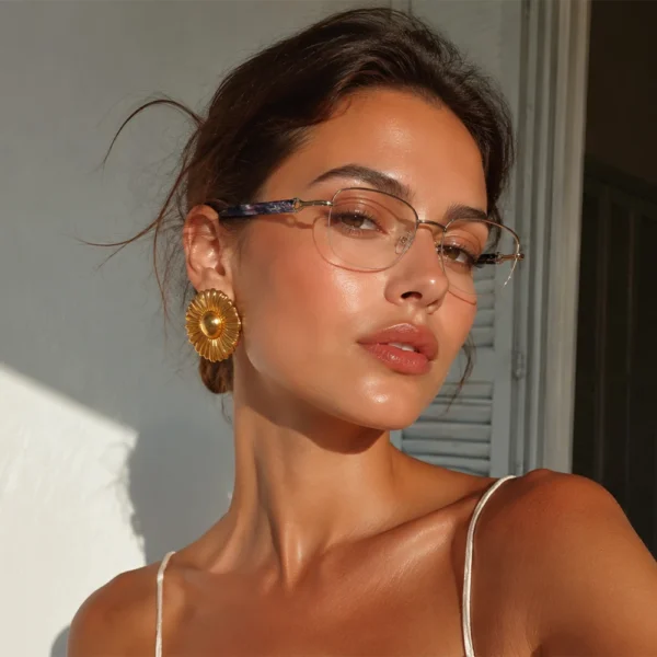 Selen Eyewear elegant rimless optical glasses worn by a woman in warm golden sunlight.