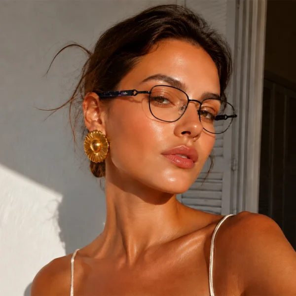 Black Selen Eyewear optical glasses displayed on a premium microfiber cloth in a modern studio setting